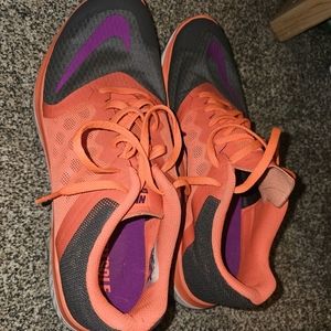 Womens size 11 nike orange grey and purple running shoes hardly worn